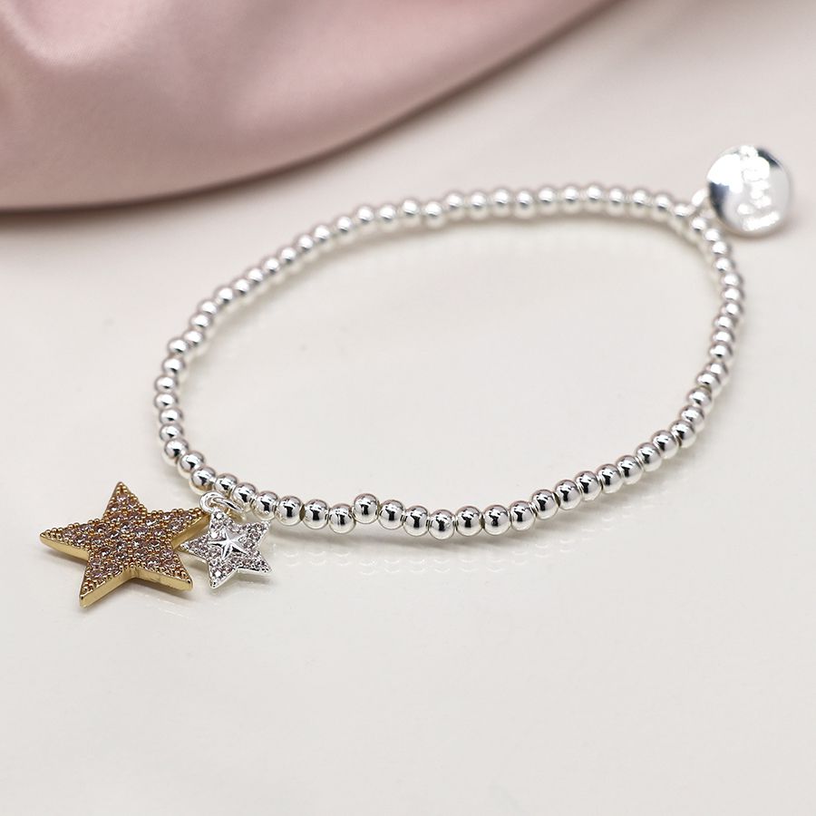 POM 04150 Silver plated bead bracelet with a double star charm, one large faux gold plated and one smaller silver plated, both inset with crystals.