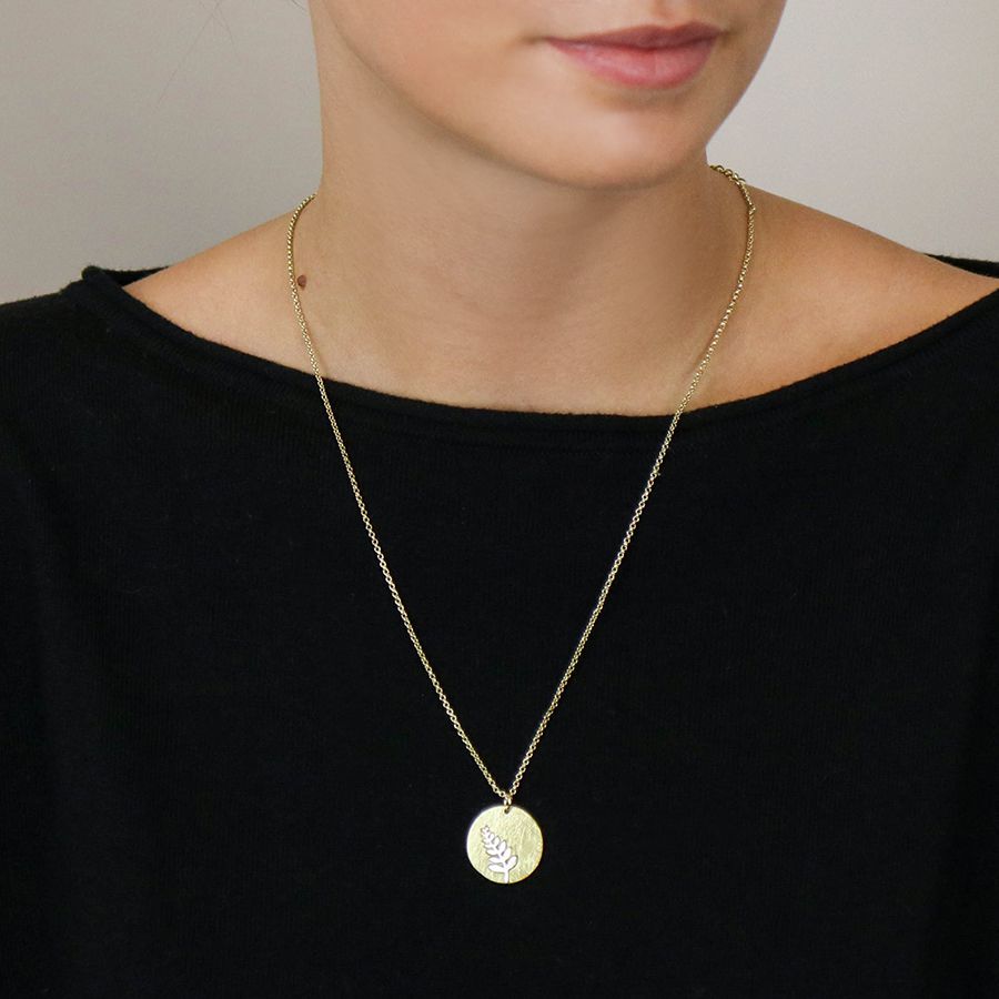 POM 04224 Faux gold scratched disc necklace with silver plated fern inlay